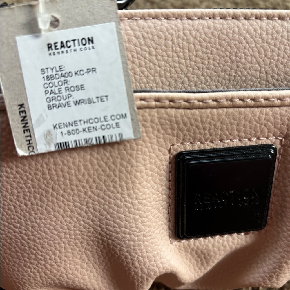 Reaction Kenneth Cole Blush Wristlet with Black Chain